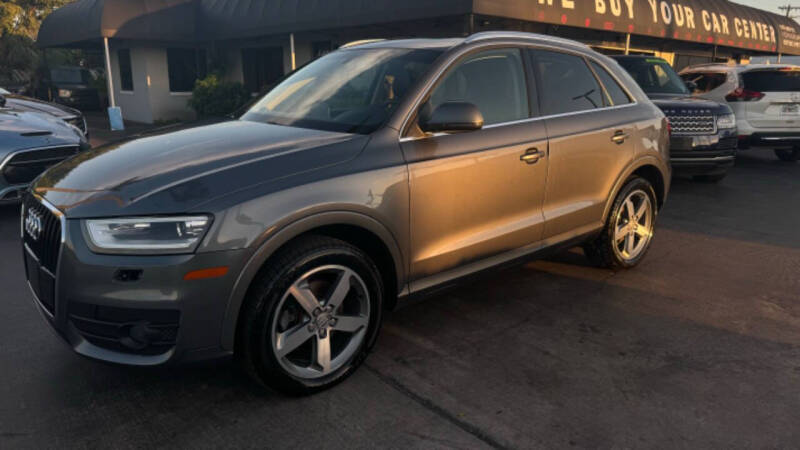 Used 2015 Audi Q3 Premium Plus with VIN WA1EFCFS9FR010670 for sale in West Palm Beach, FL