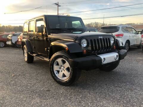 2011 Jeep Wrangler Unlimited for sale at Mass Motors LLC in Worcester MA