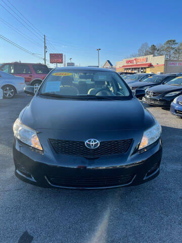 2009 Toyota Corolla for sale at SRI Auto Brokers Inc. in Rome GA