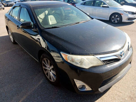 2012 Toyota Camry Hybrid for sale at CHEAPIE AUTO SALES INC in Metairie LA