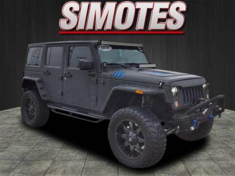 2016 Jeep Wrangler Unlimited for sale at SIMOTES MOTORS in Minooka IL