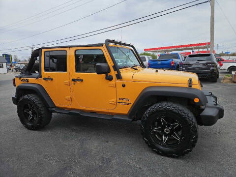 2012 Jeep Wrangler Unlimited for sale at CarTime in Rogers AR