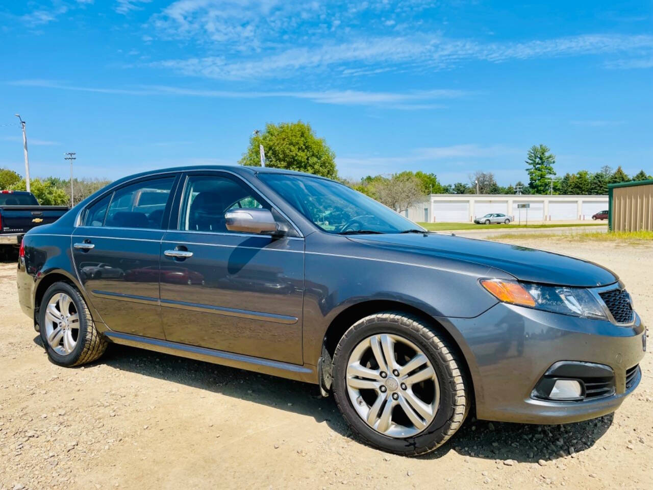 2009 Kia Optima for sale at Top Gear Auto Sales LLC in Le Roy, MN