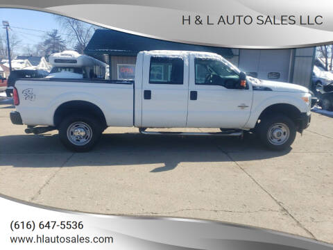2012 Ford F-250 Super Duty for sale at H & L AUTO SALES LLC in Wyoming MI
