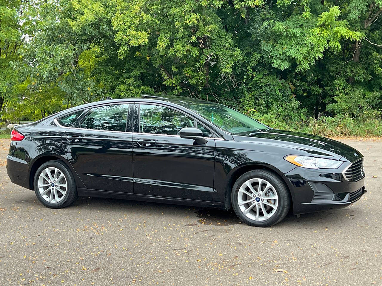 2020 Ford Fusion Hybrid for sale at Spartan Elite Auto Group LLC in Lansing, MI