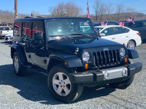 2011 Jeep Wrangler Unlimited for sale at A&M Auto Sales in Edgewood MD
