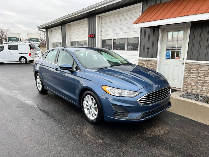 2019 Ford Fusion for sale at PARKWAY AUTO in Hudsonville MI