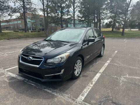 2015 Subaru Impreza for sale at QUEST MOTORS in Englewood CO