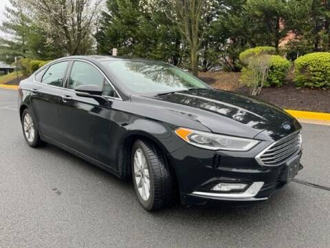 2017 Ford Fusion for sale at BOOST MOTORS LLC in Sterling VA