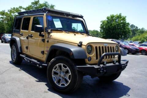 2013 Jeep Wrangler Unlimited for sale at CU Carfinders in Norcross GA