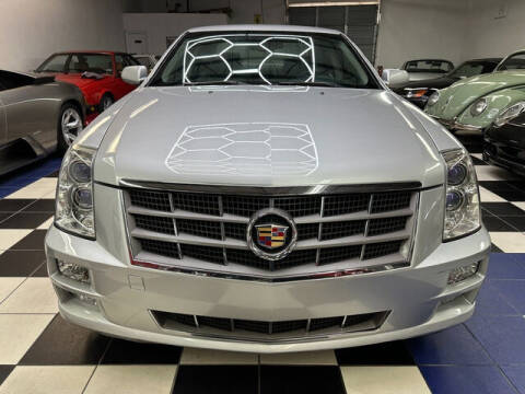 2011 Cadillac STS for sale at Podium Auto Sales Inc in Pompano Beach FL
