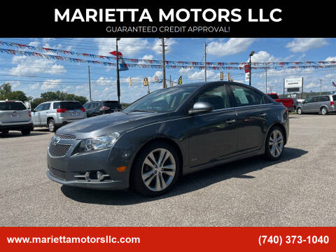 2013 Chevrolet Cruze for sale at MARIETTA MOTORS LLC in Marietta OH