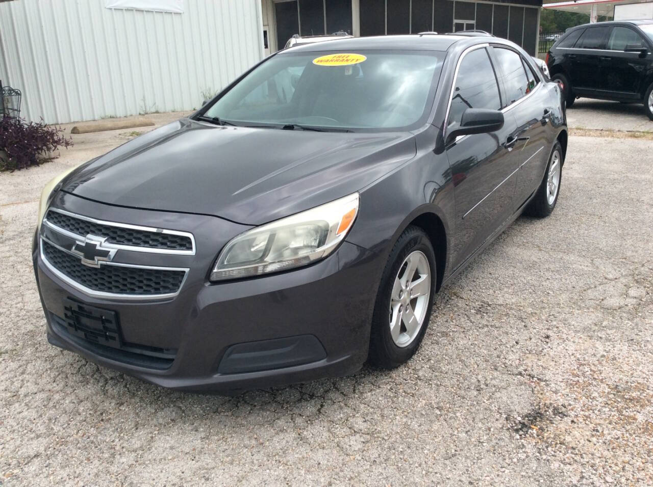 2013 Chevrolet Malibu for sale at SPRINGTIME MOTORS in Huntsville, TX