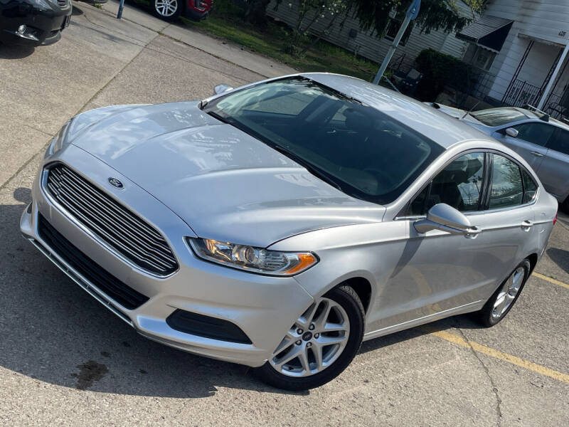 2014 Ford Fusion for sale at Exclusive Auto Group in Cleveland OH