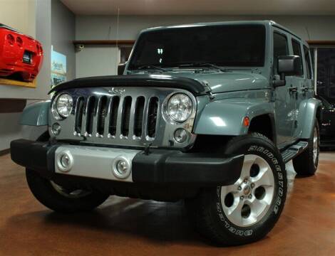 2014 Jeep Wrangler Unlimited for sale at Motion Auto Sport in North Canton OH