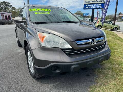 2009 Honda CR-V for sale at Cars for Less in Phenix City AL