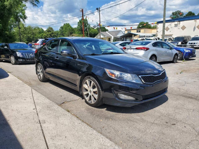 2012 Kia Optima for sale at DAGO'S AUTO SALES LLC in Dalton, GA