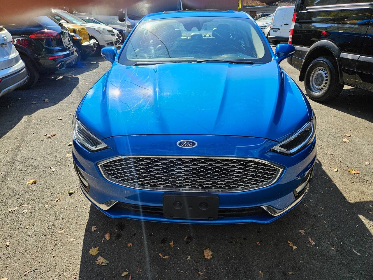 2020 Ford Fusion for sale at RENOS AUTO SALES LLC in Waterbury, CT