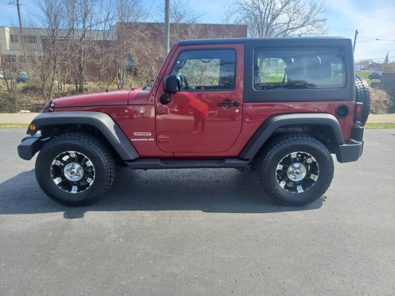 2012 Jeep Wrangler for sale at GLASS CITY AUTO CENTER in Lancaster OH