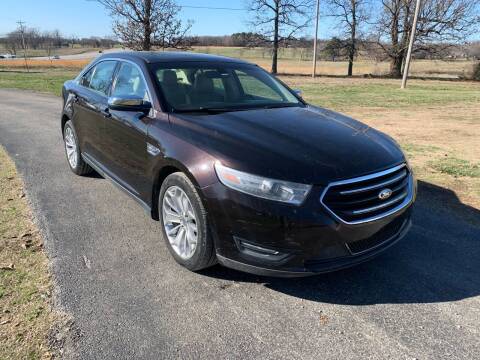 2014 Ford Taurus for sale at Champion Motorcars in Springdale AR