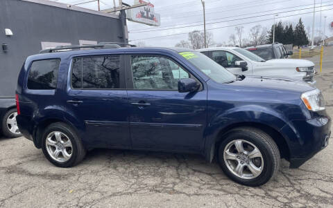 2015 Honda Pilot for sale at Castle Cars Inc. in Lansing MI