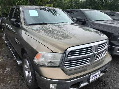 2013 RAM 1500 for sale at Simmons Auto Sales in Denison TX