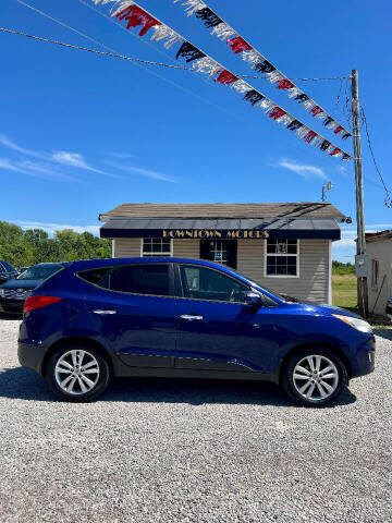 2011 Hyundai Tucson for sale at DOWNTOWN MOTORS in Republic MO