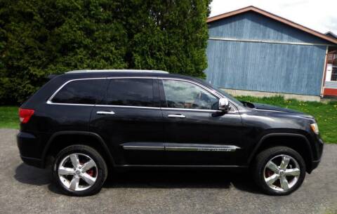 2012 Jeep Grand Cherokee for sale at CARS II in Brookfield OH