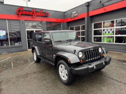 2010 Jeep Wrangler Unlimited for sale at Goodfella's  Motor Company in Tacoma WA