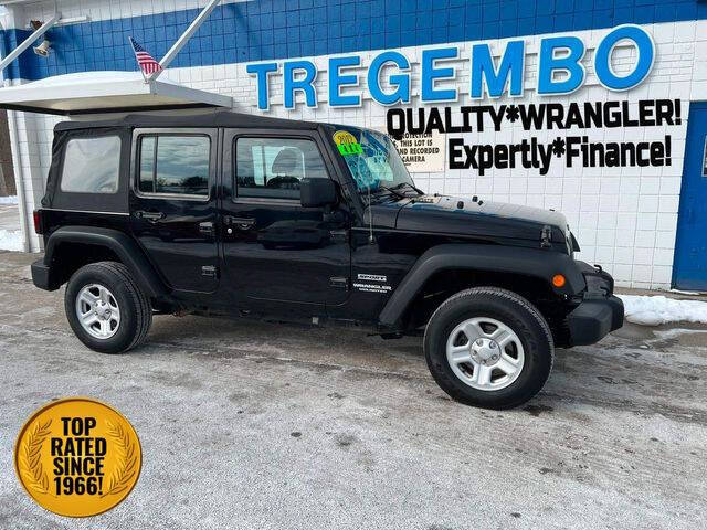 2012 Jeep Wrangler Unlimited for sale at TREGEMBO MOTORS in Bentleyville PA