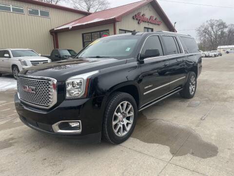 2017 GMC Yukon XL for sale at Azteca Auto Sales LLC in Des Moines IA