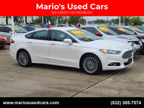 2013 Ford Fusion for sale at Mario's Used Cars in Houston TX
