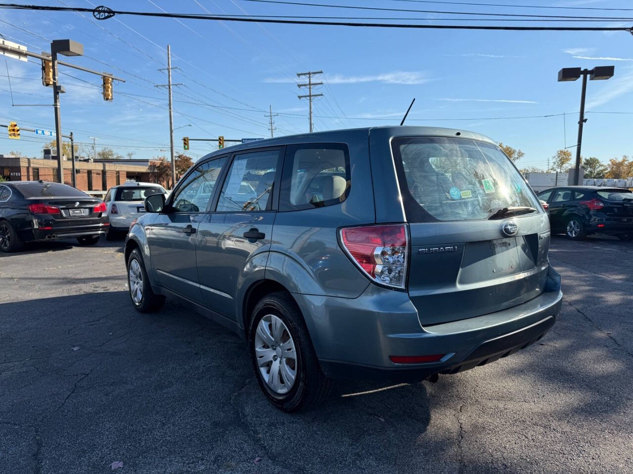 2009 Subaru Forester for sale at AVS AUTO GROUP LLC in CLEVELAND, OH