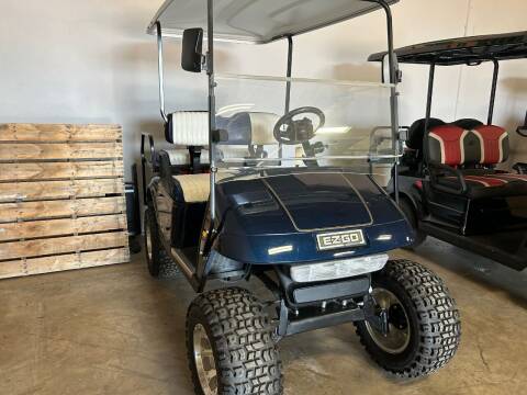 2010 E-Z-GO TXT 2+2 lifted for sale at ADVENTURE GOLF CARS in Southlake TX