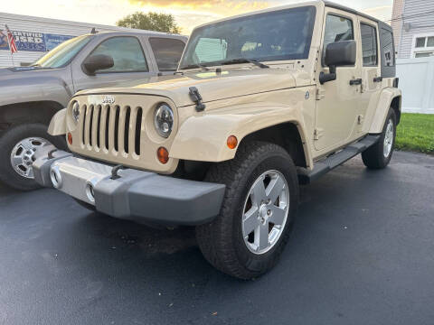 2011 Jeep Wrangler Unlimited for sale at Action Automotive Service LLC in Hudson NY