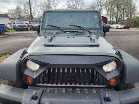 2009 Jeep Wrangler Unlimited for sale at Johnsons Car Sales in Richmond IN