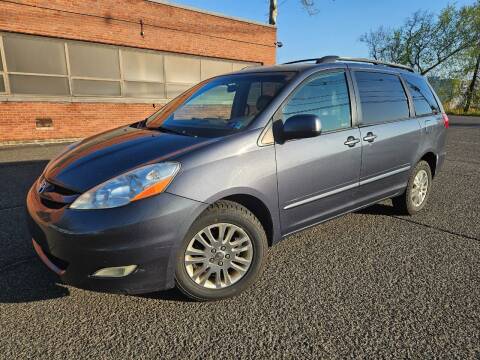 2007 Toyota Sienna for sale at Positive Auto Sales, LLC in Hasbrouck Heights NJ