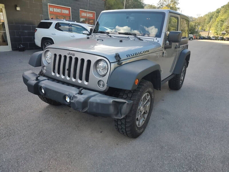 2017 Jeep Wrangler for sale at Tommy's Auto Sales in Inez KY