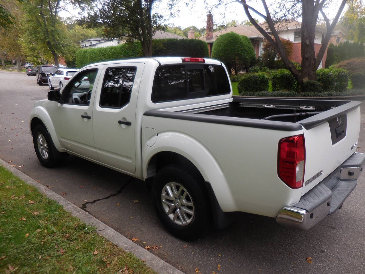 2015 Nissan Frontier for sale at PRESTIGE MOTORS LEASING CORP in Roslyn Heights, NY