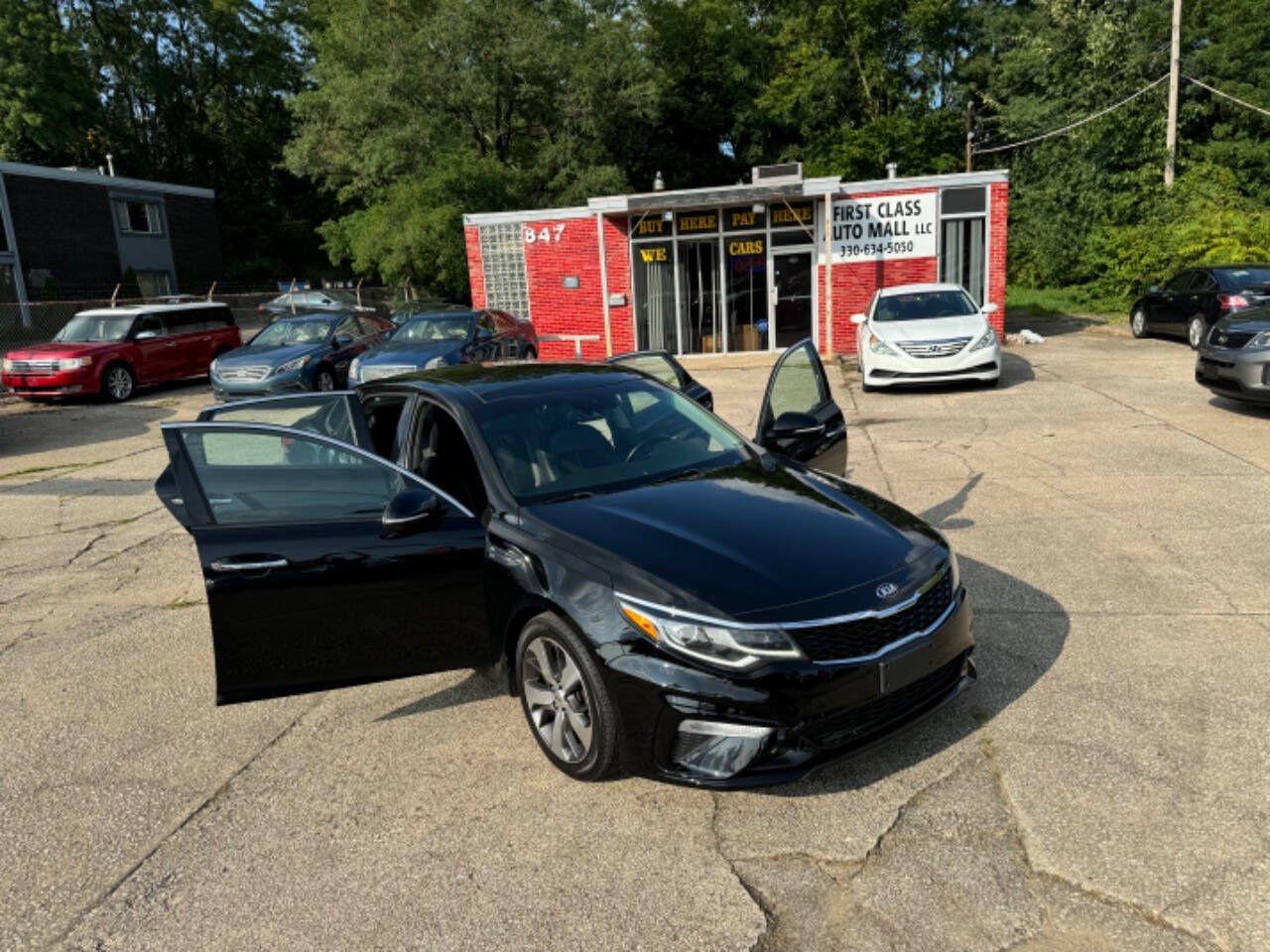 2019 Kia Optima for sale at First Class Auto Mall in Akron, OH