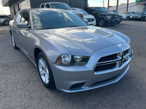 2013 Dodge Charger for sale at JQ Motorsports East in Tucson AZ