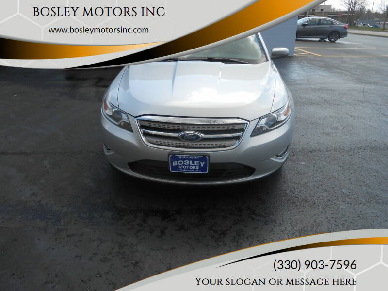 2011 Ford Taurus for sale at BOSLEY MOTORS INC in Tallmadge OH