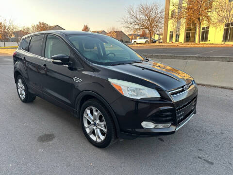 2013 Ford Escape for sale at The Car-Mart in Bountiful UT