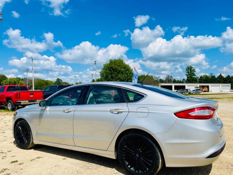 2016 Ford Fusion for sale at Top Gear Auto Sales LLC in Le Roy, MN