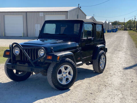 1999 Jeep Wrangler for sale at Andover Auto Group, LLC. in Argyle TX