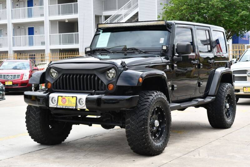 2011 Jeep Wrangler Unlimited for sale at Houston Used Auto Sales in Houston TX