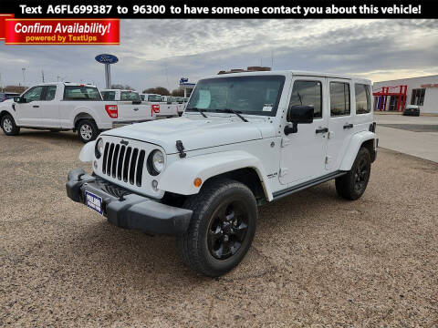 2015 Jeep Wrangler Unlimited for sale at POLLARD PRE-OWNED in Lubbock TX