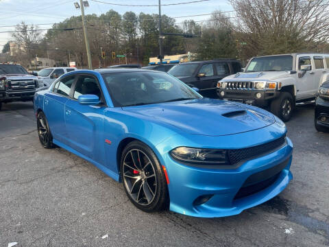 2015 Dodge Charger for sale at Magic Motors Inc. in Snellville GA