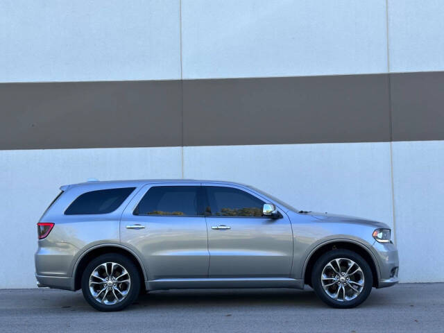 2019 Dodge Durango for sale at Phoenix Motor Co in Romulus, MI