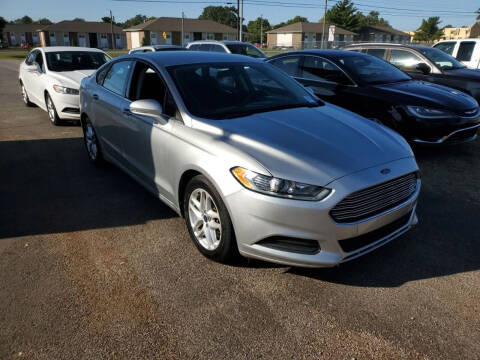 2014 Ford Fusion for sale at Cars Trucks & More in Howell MI